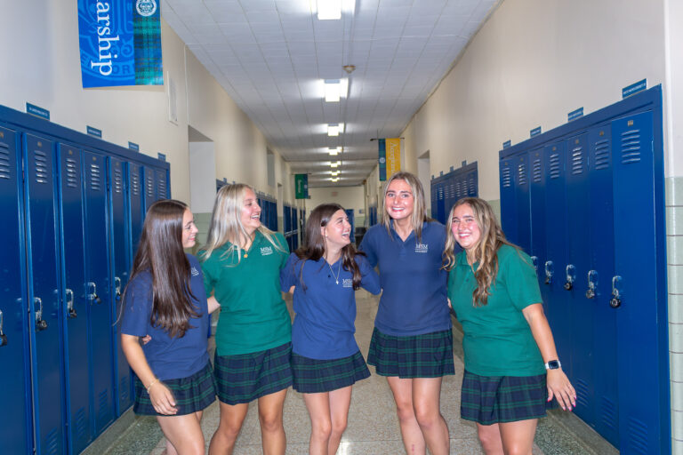 Group of happy girls in the hallway at Mt St Mary Academy